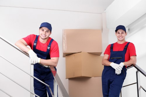 Customer moving storage items carefully in a unit area